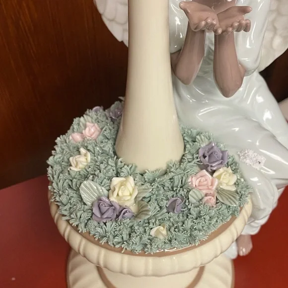 Grandeur Noel Porcelain Angel sculpture in fountain